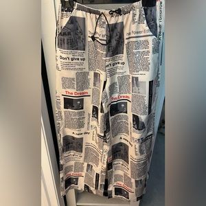 Newspaper print-style spring/summer pants.
